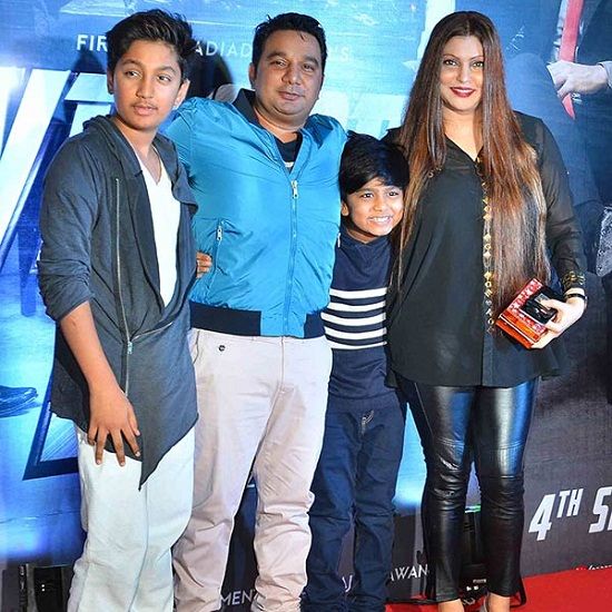 Ahmed Khan with his wife and sons