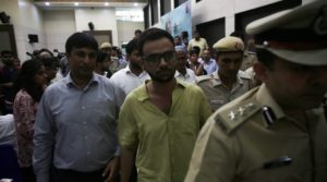 Umar Khalid accompanied by the police after the incident