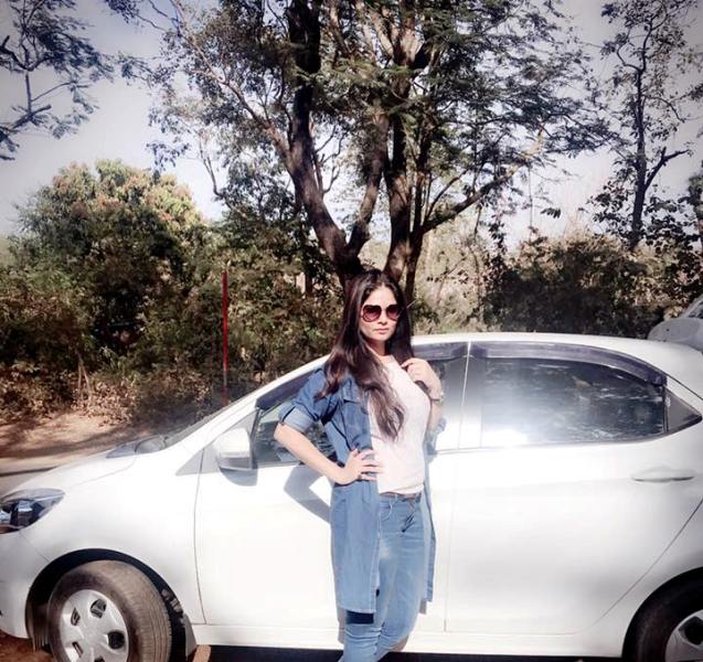 Aabha Paul Posing with Her Car