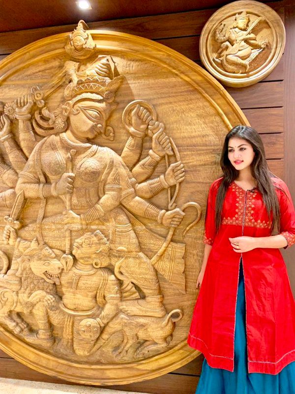 Rittika Posing in front of the Idol of Goddess Durga