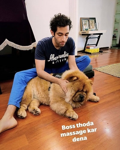 Aadar Malik and his pet dog